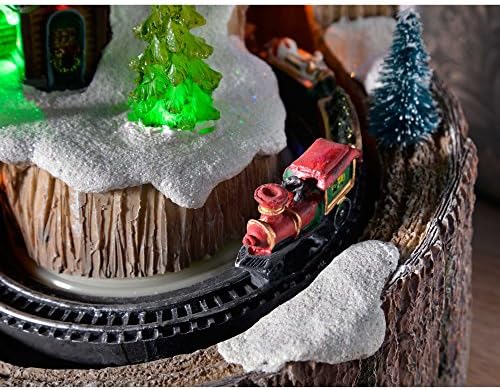Pre-Lit LED Christmas Village on a Tree Stump with a Rotating Train, 20 cm - Multi-Colour