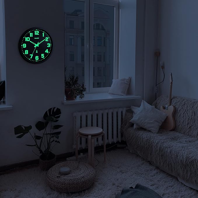 Sharp Glow in the Dark Atomic Analog Wall Clock - 12" Clock with Black Frame - Sets Automatically - Battery Operated - Easy to Read - Easy to Use – See Day or Night!